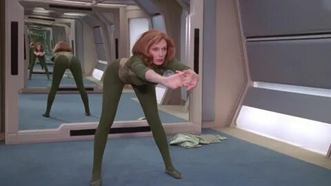 Gates McFadden - Dr Beverley Crusher engaging in space yoga 
