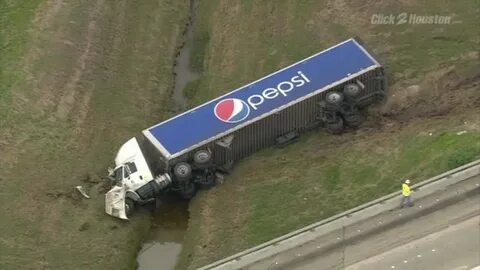 Raw video: Pepsi truck overturns - YouTube