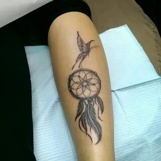 Butterfly fly over along with this dreamcatcher Small tattoo