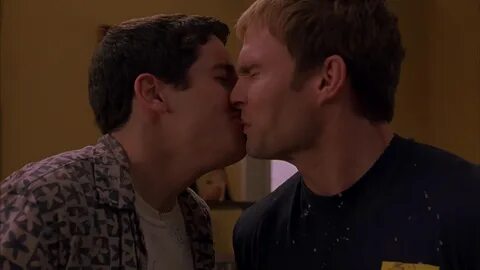 ausCAPS: Seann William Scott and Jason Biggs kiss in America