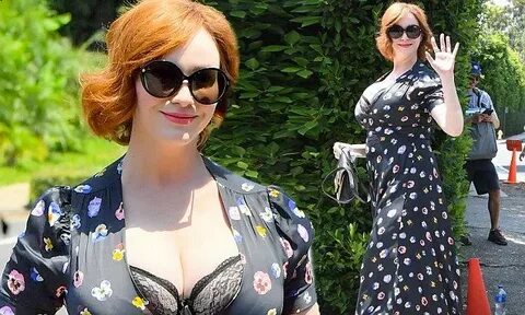 Christina Hendricks flashes her bra in a plunging gown at In