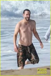 Keanu Reeves Looks Fit Shirtless at the Beach in Malibu: Pho