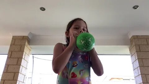 Zoe likes blowing balloons - YouTube