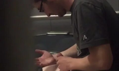 man caught jerking off restroom.