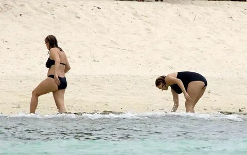 Pregnant LEA SEYDOUX in Swismuit at a Neach in Mauritius 12/