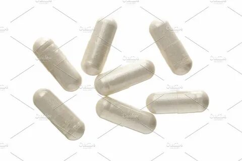 White pill capsule isolated on white background top view fla