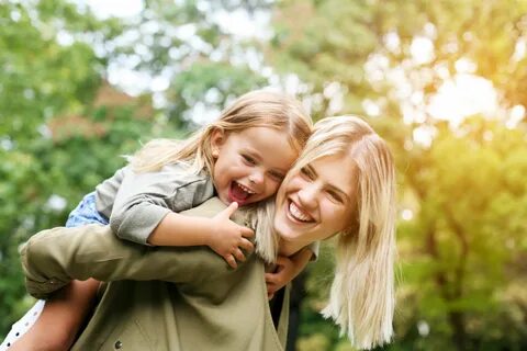 Mother and Daughter Laughing - Sumner and Associates, P.C.