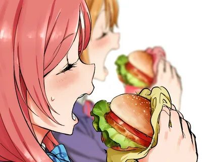 Zweite süße Bilder von Mädchen, die einen Hamburger Essen se