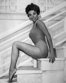Rita Moreno in bathing suit, 1956. - Bygonely