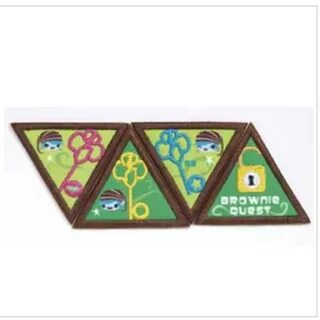 The Brownie Quest key badges are earned as Girl Scouts compl