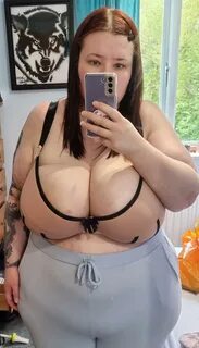 Laura before her surgery with her P sized boobs. 