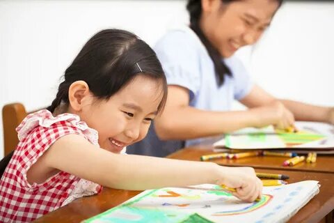 Asian girl helping in child relief