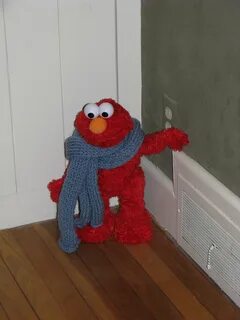 Couldn't find elf on a shelf. But found Elmo hiding in the c
