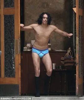 Russell Brand hot-foots it from church in nothing but his pa