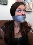 Lydia black tape gagged and groped in bondage