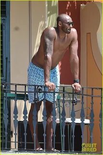 Kobe Bryant Hangs Shirtless By the Pool During Family Vacati