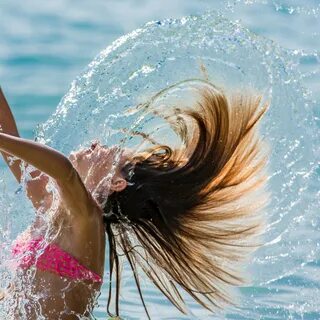 girl-in-pink-bathing-suit-slinging-hair-and-water image - Fr