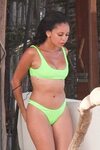 Vanessa Morgan - In a neon bikini enjoys on the beach in Tul