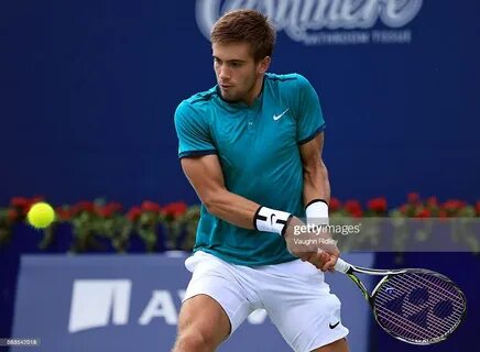 Borna Coric of Croatia plays a shot against Tomas Berdych of