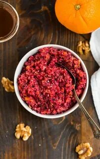 Easy homemade cranberry orange relish in a white bowl with w