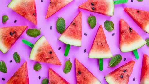 Some slices of watermelon, summer fruit, pink background 108