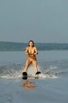 Naked Marine Sports nudist is not only lying on the beach of