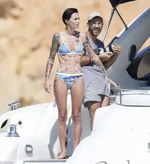 Ruby Rose shows off her tattooed bikini body in blue two-pie