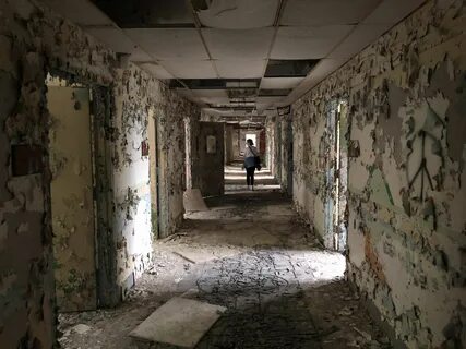A pic of my friend in an abandoned psychiatric hospital. Ups