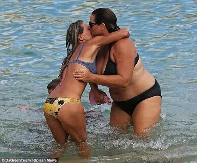 Pierce Brosnan watches on as bikini-clad wife Keely Shaye Sm