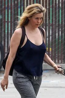 alicia silverstone keeps it comfy as she steps out to walk h