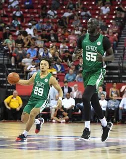 Celtics' Tacko Fall towers over teammate Carsen Edwards in m