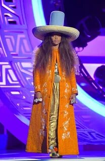 Erykah Badu Wore Not One, But Four Over-the-Top Hats To Host