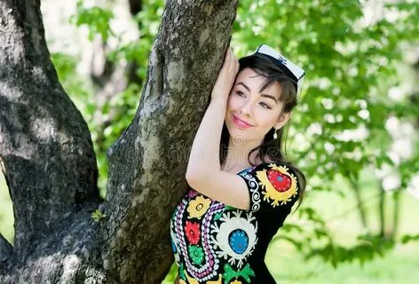 Girl, woman in national historicTajik costume. 