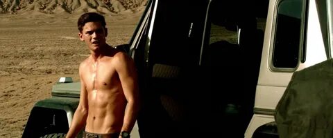 ausCAPS: Jeremy Irvine shirtless in Beyond The Reach