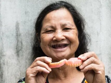 Old Thai Woman Holding False Teeth Stock Photo - Image of pe