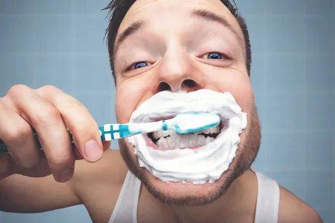 Brushing Your Teeth This Many Times a Day Could Protect You 