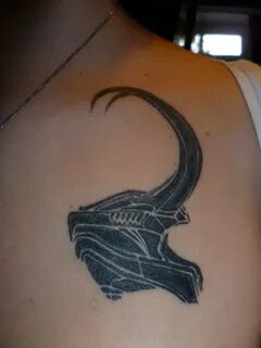 Helmet Tattoos - Black Ink Loki’s On Chest