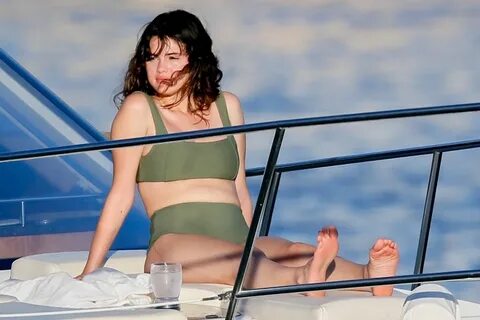 Selena Gomez In bikini green aboard luxury yacht in Hawaii -