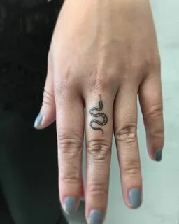 25+ Amazing Small Snake Tattoo Ideas & Designs Finger tattoo