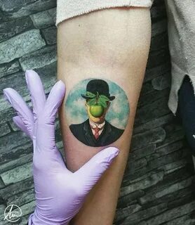 Tattoo by Andrea Morales; Son of Man by René Magritte Histor