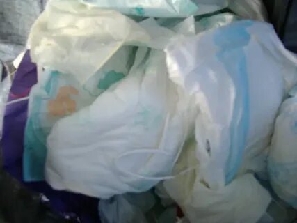 Stinky Diapers..... Stinky Diapers in the trash bag..... Dis