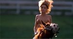 Betsy Russell showing her nice big tits while ride horse - P