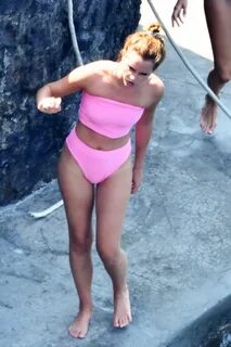 emma watson seen wearing a pink bikini while on vacation in 