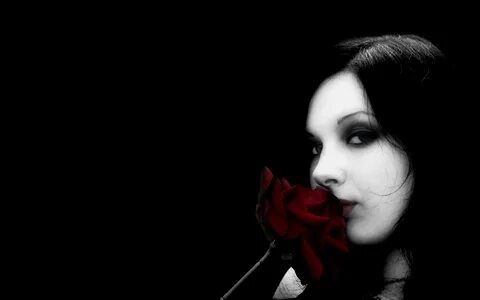Gothic Woman Smelling a Rose