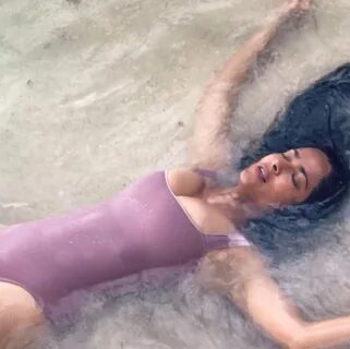 Salma Hayek Lounges in a Swimsuit as the Ocean Waves Crash O