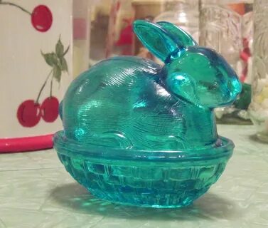 Glass candy dish of a bunny rabbit on nest. I have several o