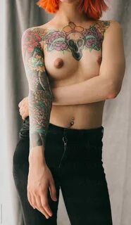 "Tattooed Topless Woman In Black Jeans" by Stocksy Contributor &q...