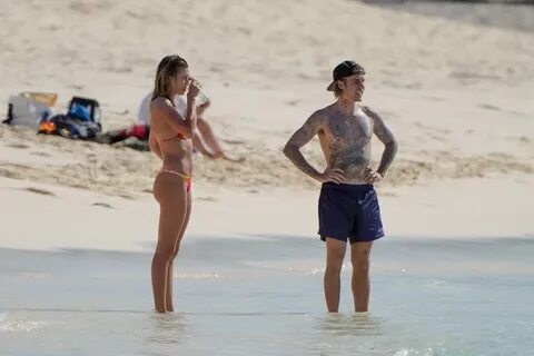 Hailey Baldwin in a tiny colorful bikini with Justin Bieber 