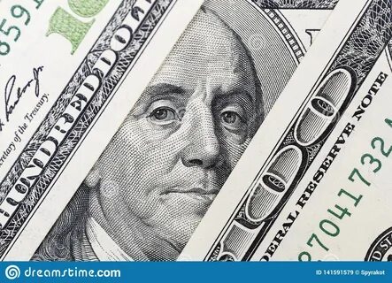 Benjamin Franklin`s Eyes from a Hundred-dollar Bill. the Fac