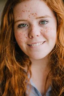 Close Up Portrait Of A Teenage Girl With Freckles And Ginger
